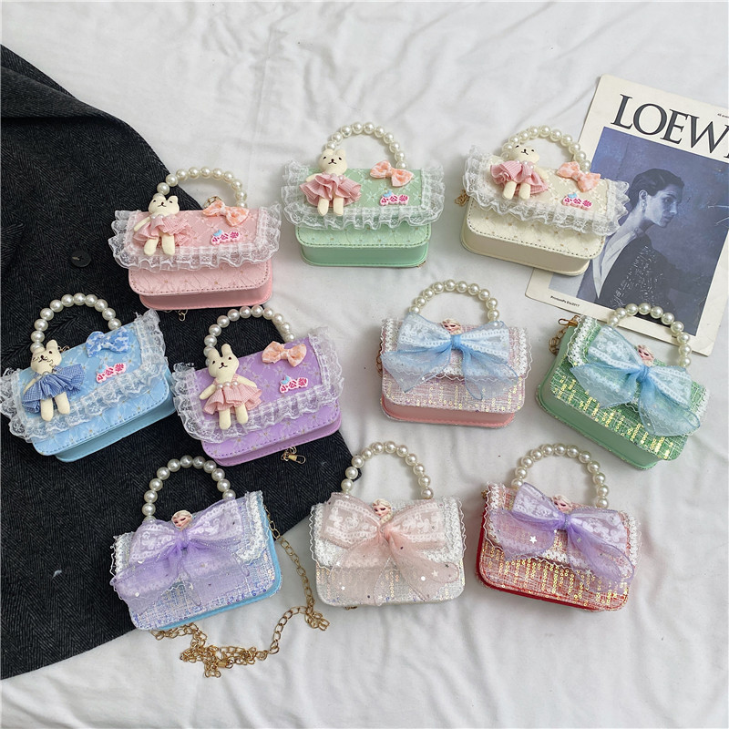 2025 nuevo pequeño viento de fragancia bolsos infantiles mil pájaros pequeños conejos de flores princesa mochila perlas bolsos de moda