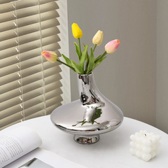 Modern light luxury electroplated silver irregular shaped creative ceramic vase, creative minimalist desktop hotel decoration