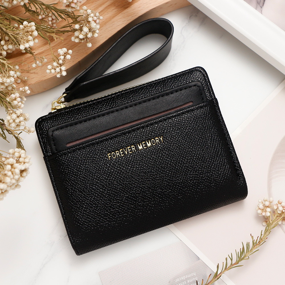 Nueva billetera corta de mujer fresca y simple doble cremallera bolso de cambio multi-tarjeta bolso multifuncional