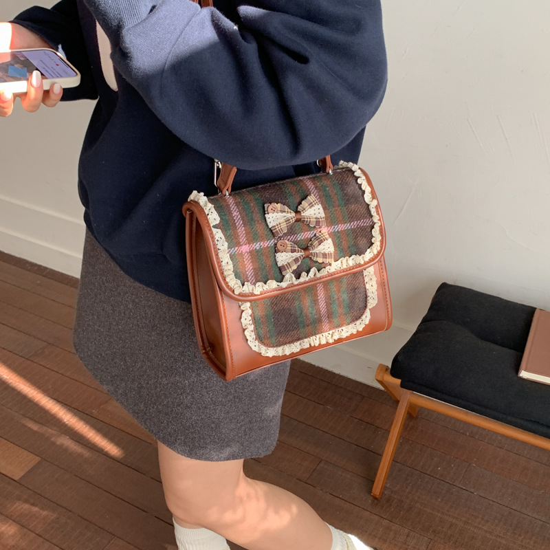 Nuevo bolso de niños a cuadrillas, escuela de artes, estilo mini mochila de estudiantes, lindos arcos, bolsas de hombro para hombres y mujeres.