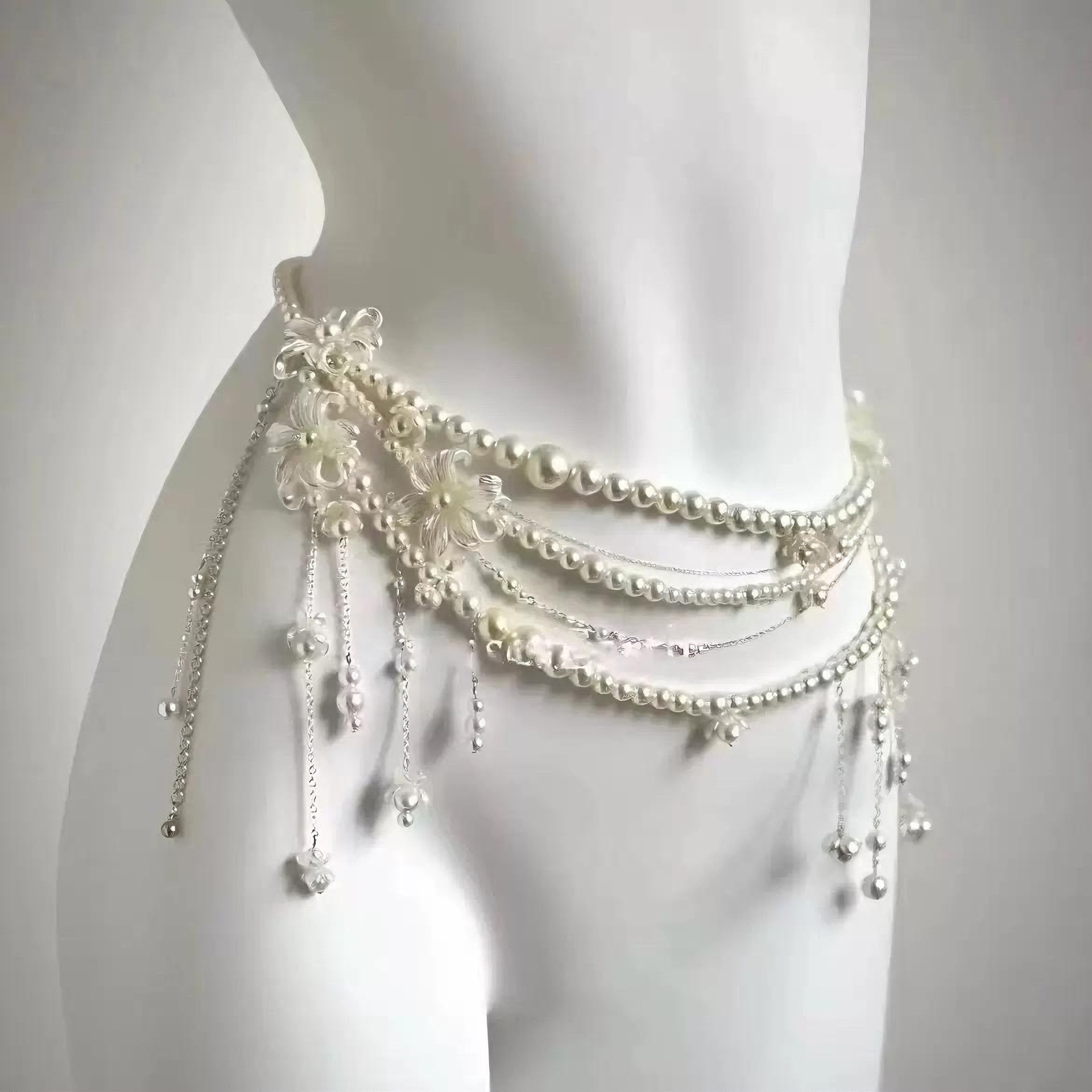Luz lujosa y sexy flor perla cintura multicapa cadena de moda alta personalidad nicho temperamento combinado cintura mujer