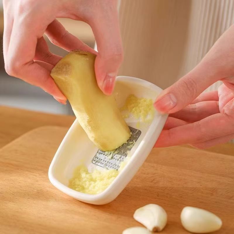 Mastillo de jengibre molido, artefacto de la cocina, moledor de jengibre molido a mano, moledor de jengibre molido a mano, moledor de jengibre molido a mano, disco de molienda de jugo de jengibre