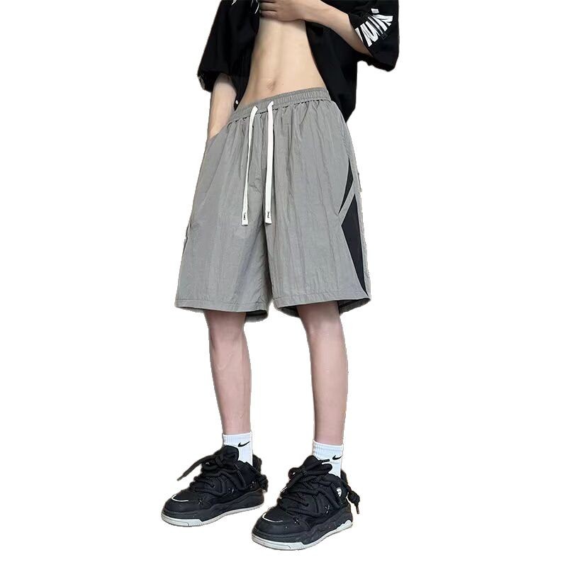 Pantalones cortos de asalto para hombres de verano delgados y rápidos secos pantalones de baloncesto americano pantalones de gimnasio de cinco puntos