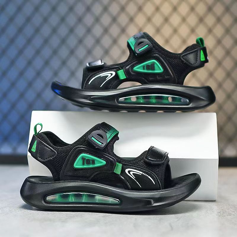 Nuevas sandalias 2025 zapatos de playa de verano masaje suela suave partículas al por mayor antideslizante cojín de aire de playa para niños