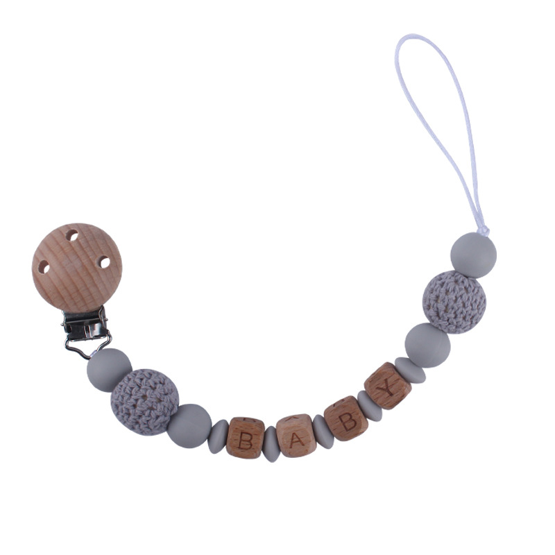 Bebé suministros de dibujos animados de haya animal pulsera de silicona DIY nombre calmante bebé molar juguete anti-caída de la cadena