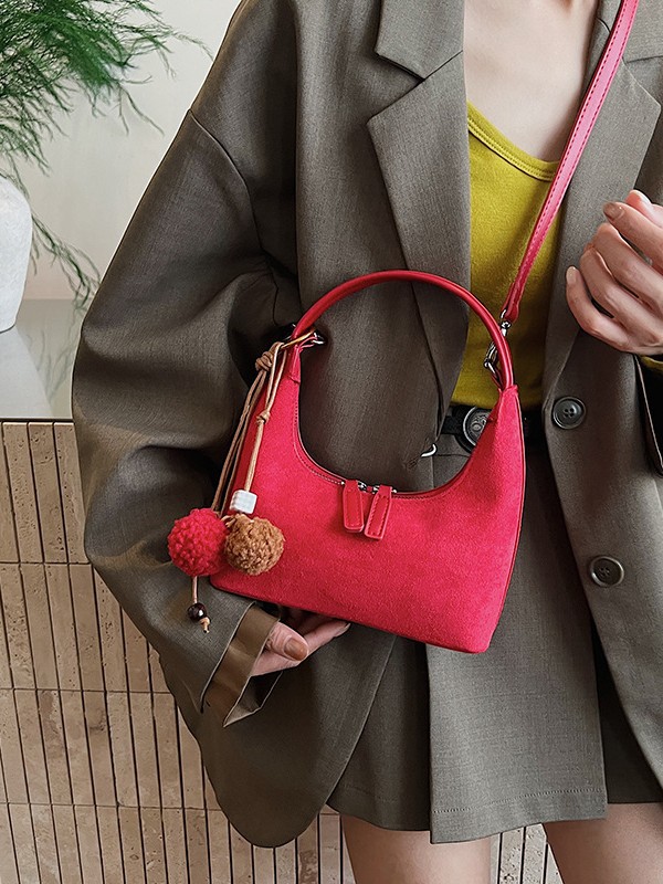 2025 nueva textura bolsas de brazo mujeres otoño de alto nivel bolsas de mano de nicho bolsas de mano coreanas bolsas de饺os versátiles