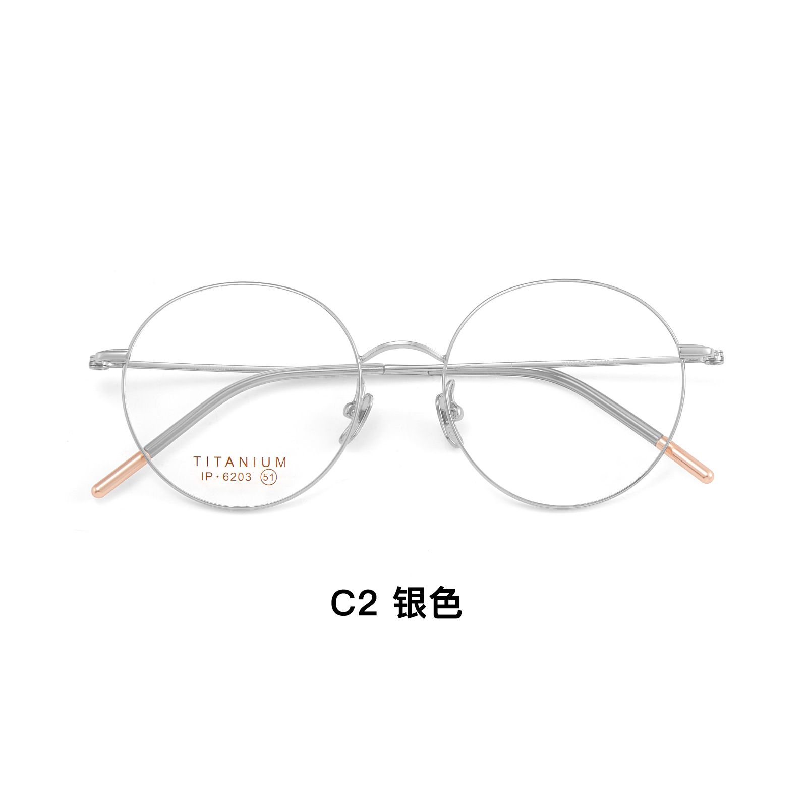 Marco redondo reducente de edad simple Marco de gafas de titanio puro retro ultraligero Pierna de titanio flexible Anti-deformación Sin cara de sujeción Lote de gafas Danyang