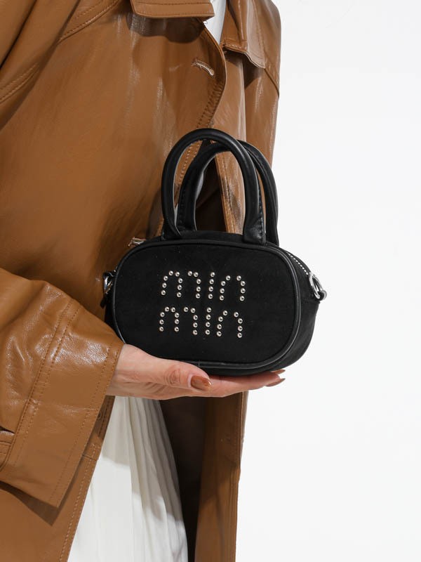 Alta sensación retro de seda mini bolso de mano para mujeres 2025 nuevo alta sensación de humedad de moda mochila