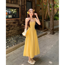 多巴胺黄色吊带连衣裙女夏泰国旅游海边度假风露背绑带法式长裙子