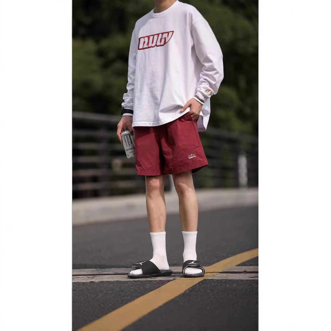 Summer Japanese travel solid color quick dry sports shorts for men…