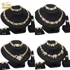 クロスボーダーのファッション18kゴールドネックレスのブレスレットのイヤリングの指輪の結婚式のアクセサリーの4つのセットの花嫁のアクセサリーの現物のバッチ
