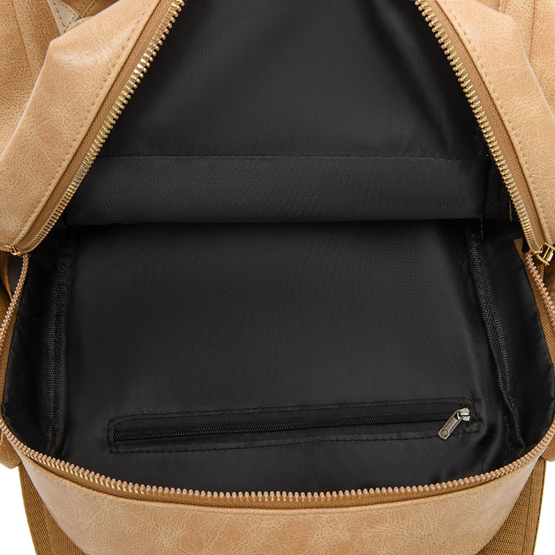 Transfronterizo nuevo estilo coreano mochila de gran capacidad para mujer PU mochila de cuero suave moda rombo mochila de viaje multifuncional