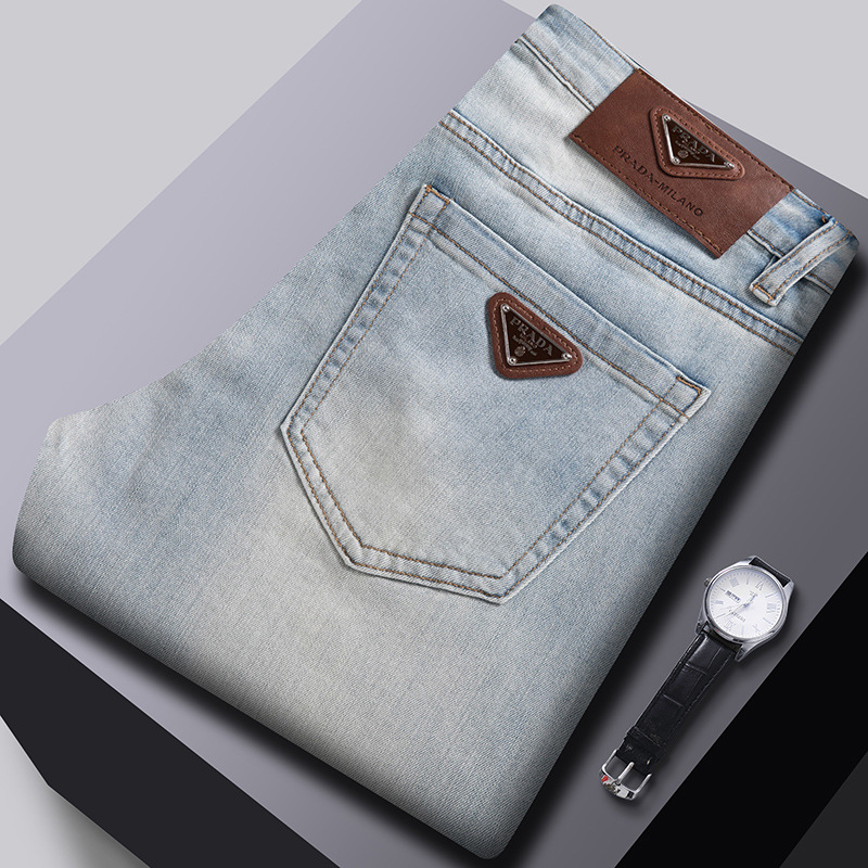 Primavera nuevos jeans para hombres coreanos delgados pies pequeños comercio exterior transfronterizo de alta calidad elástico Europa y los Estados Unidos 1: 1 pantalones al por mayor