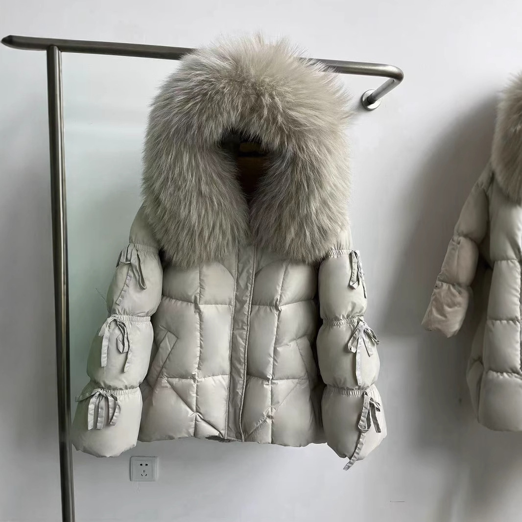 Vêtements pour femmes Hiver Nouveau haut de gamme fourrure grand col à capuche doudoune femme sangle papillon manteau chaud épaissi_voghion.com