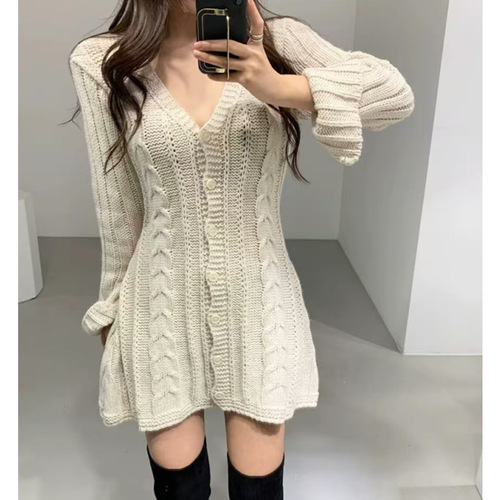 A lightweight, chic Korean-inspired youthful style V-neck linen pattern one-button open front design knit dress with slits at the sleeves