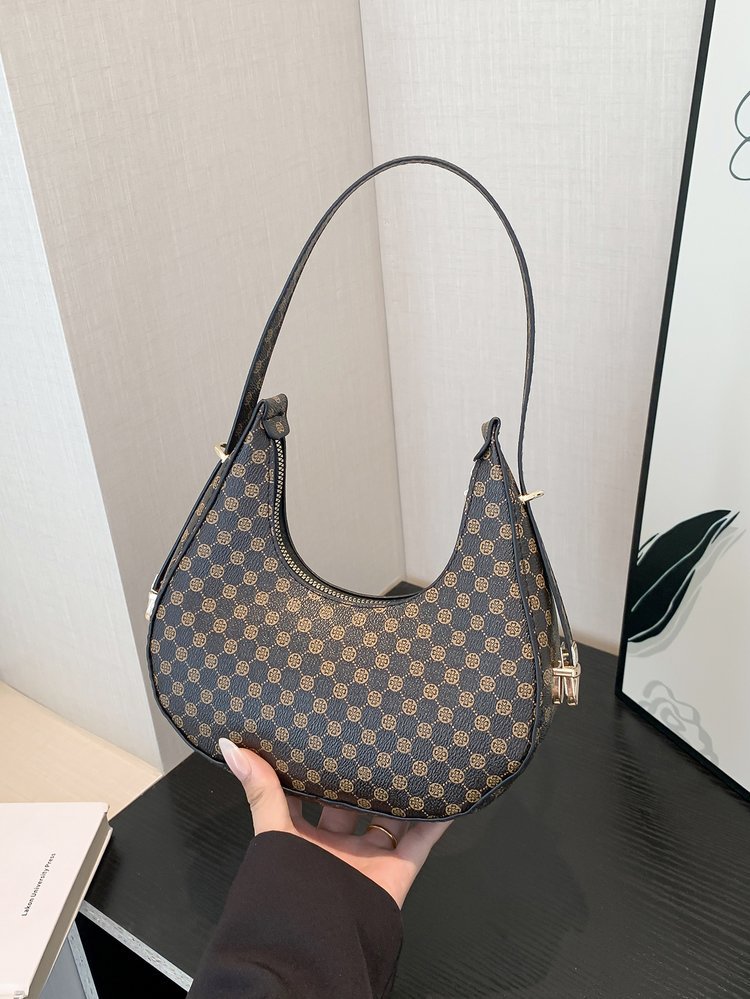 Exquisita moda con estampado de leopardo 2024 nuevo estilo estilo occidental patrón de cebra personalidad textura tendencia mensajero portátil bolso de luna nueva mujer