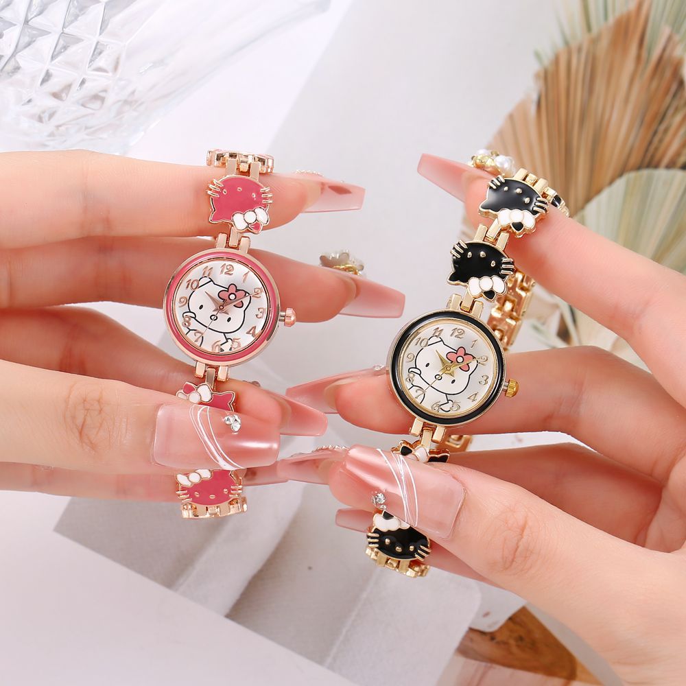 Nueva moda reloj de gato temperamento de mujer linda pulsera de cinturón de acero reloj reloj de cuarzo electrónico para mujer y estudiante