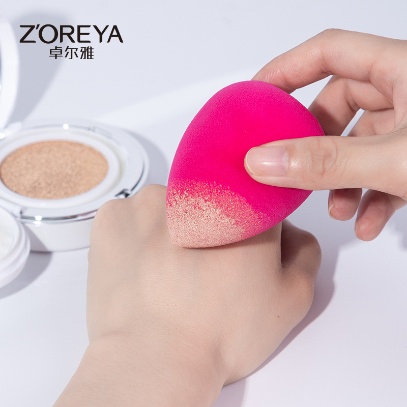 Zhuolya nuevo maquillaje huevo esponja puff belleza herramienta bolsa color sólido maquillaje huevo venta al por mayor traje de huevo de belleza