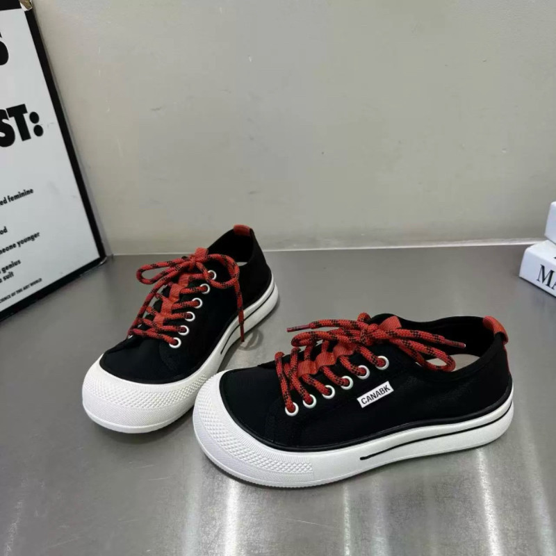 Zapatos de lona de cabeza redonda transpirables de color sólido de suela gruesa para mujeres verano de 2026 nuevos zapatos de lona casuales de correa de color sólido coreano