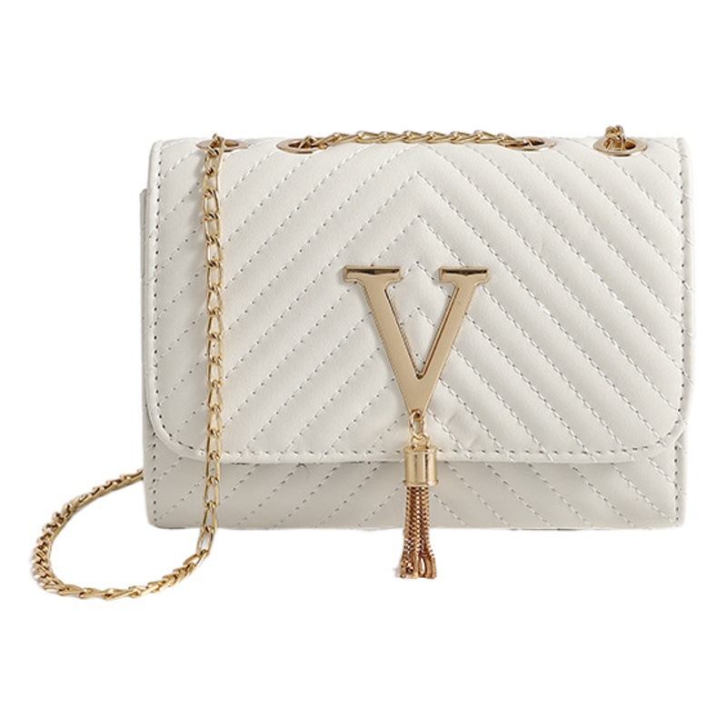 Bolso de mujer bolso de hombro 2023 nueva moda bolso de hombro bordado a rayas borla bolsa decorativa bolsa de mensajero entrega de una pieza