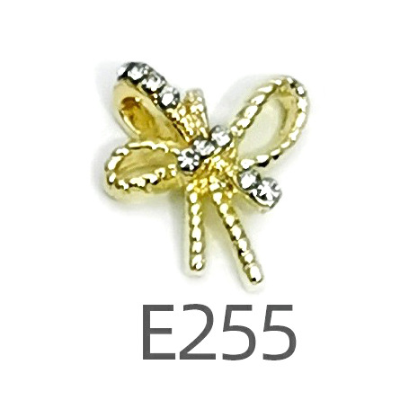 Transfronterizo Japonés arco de uñas accesorios de pajarita caliente simple todo fósforo tridimensional hueco joyería de uñas de diamantes al por mayor