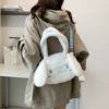 Big crossbody white dog