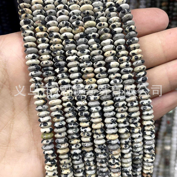 Spotted disc bead
