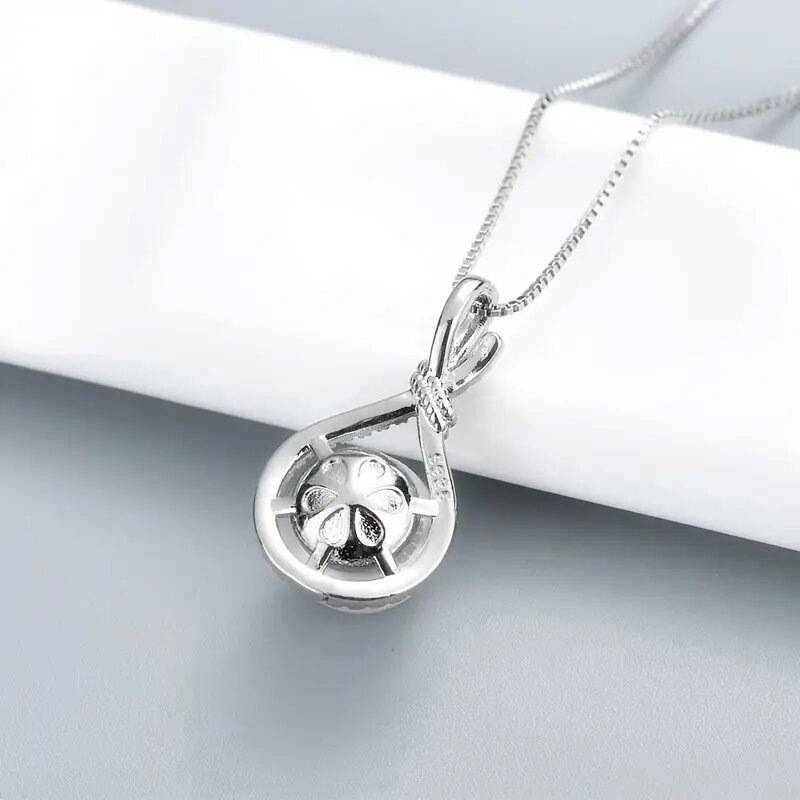 Collier pendentif perle avec zircon et finition or blanc_voghion.com