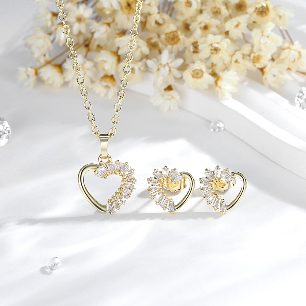 Ventas transfronterizas en caliente de Europa y los Estados Unidos colgante de corazón set de cobre 14K oro zircón collar joyería pendientes