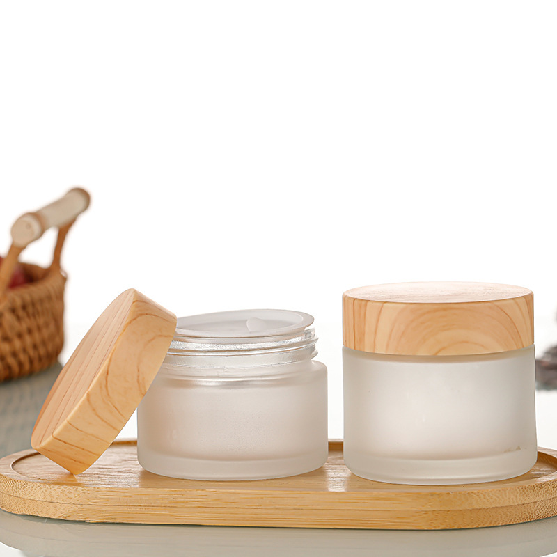 Botella de crema de vidrio con tapa de grano de madera, botella de crema facial esmerilada, botella de cosméticos portátil, botella de crema para ojos, muestra de botella, botella de empaque al por mayor