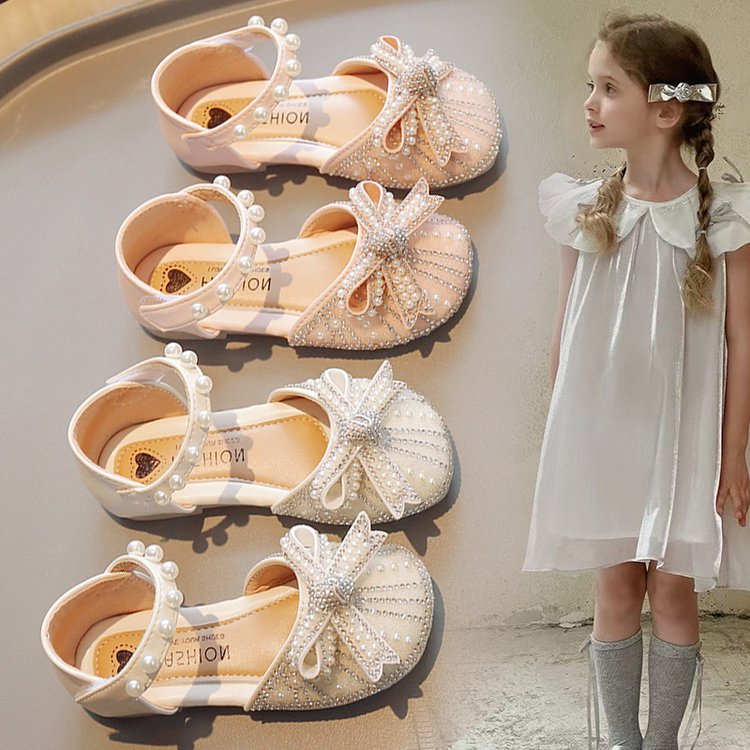 Zapatos de cristal para niñas 2026 verano nuevas sandalias de cabeza de bolsillo para niños pequeños zapatos de princesa suaves zapatos de baile de niñas