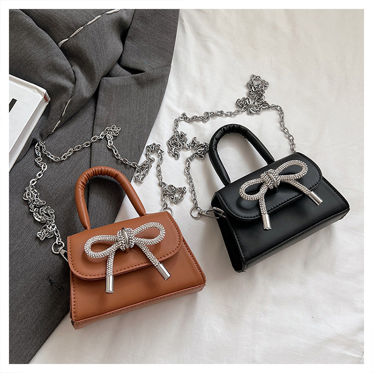 Ins niche French textured bag female 2024 new bow small square bag stylish shoulder messenger bag_voghion.com