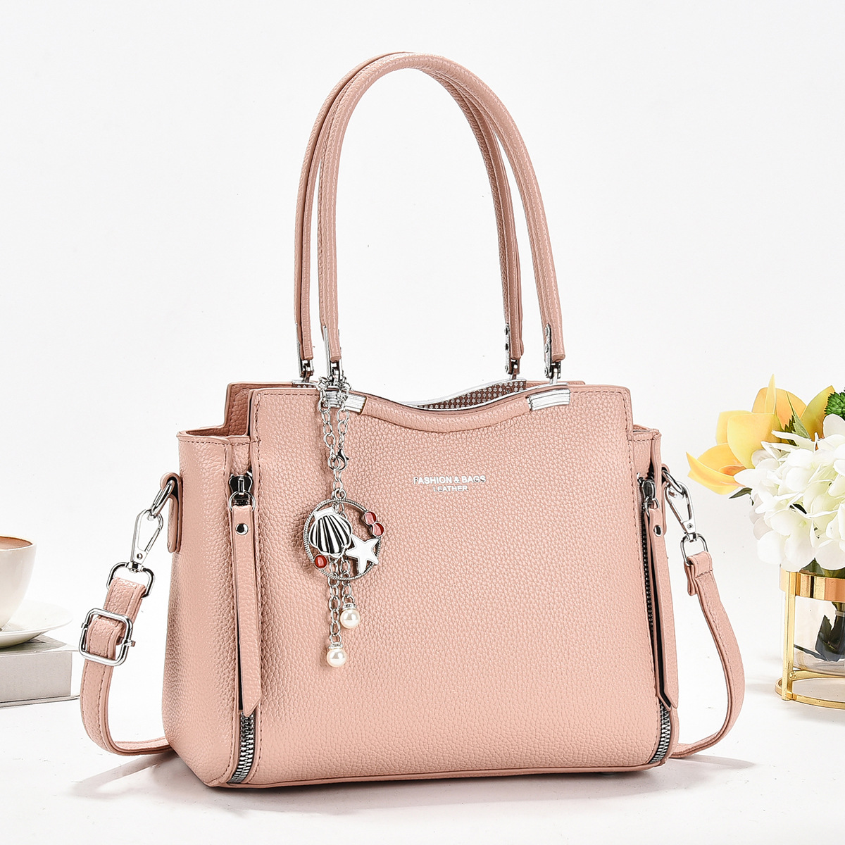 Bolso de madre de mediana edad de gran capacidad para mujer 2025 nuevo bolso atmosférico bolso de mensajero simple bolso de alta gama para mujer