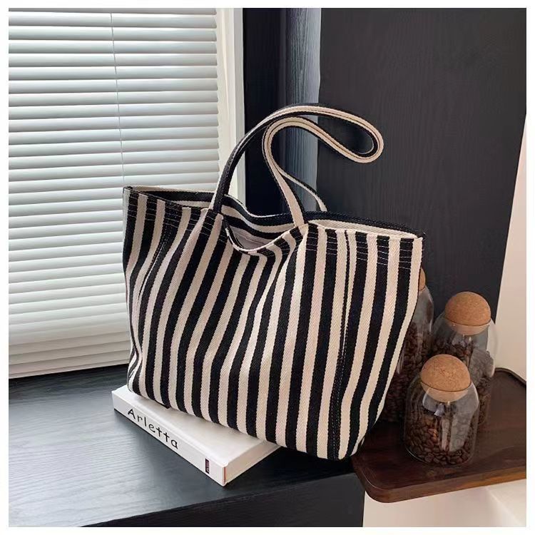 Pequeña bolsa de lona a rayas frescas de hombro para mujeres, bolsas escolares de clase de gran capacidad, bolsas de compras japonesas y coreanas, bolsas especiales.