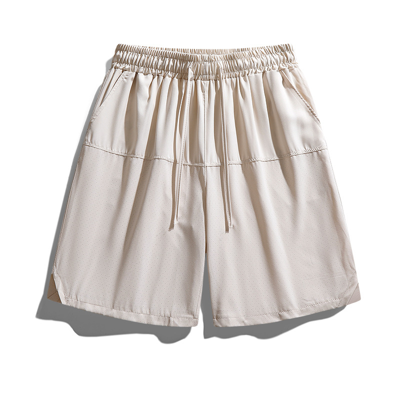 Pantalones cortos casuales de color sólido verano nuevo estilo delgado perforado transpirable pantalones de cinco puntos pantalones sueltos casuales de cinco puntos