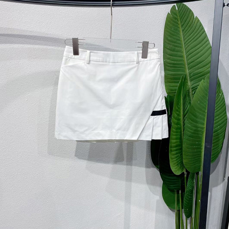 新しいゴルフの女性のスカートの運動の弾力性のファッションのデザイン感の百のフリルのスカートはお尻を包んで光のゴルフのスカートを歩くことを防ぎます。