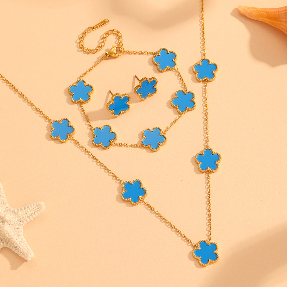 Nueva moda europea y americana no-desvanecimiento de acero de titanio de cinco hojas serie de trébol de moda de lujo ligero espárragos pulsera collar traje