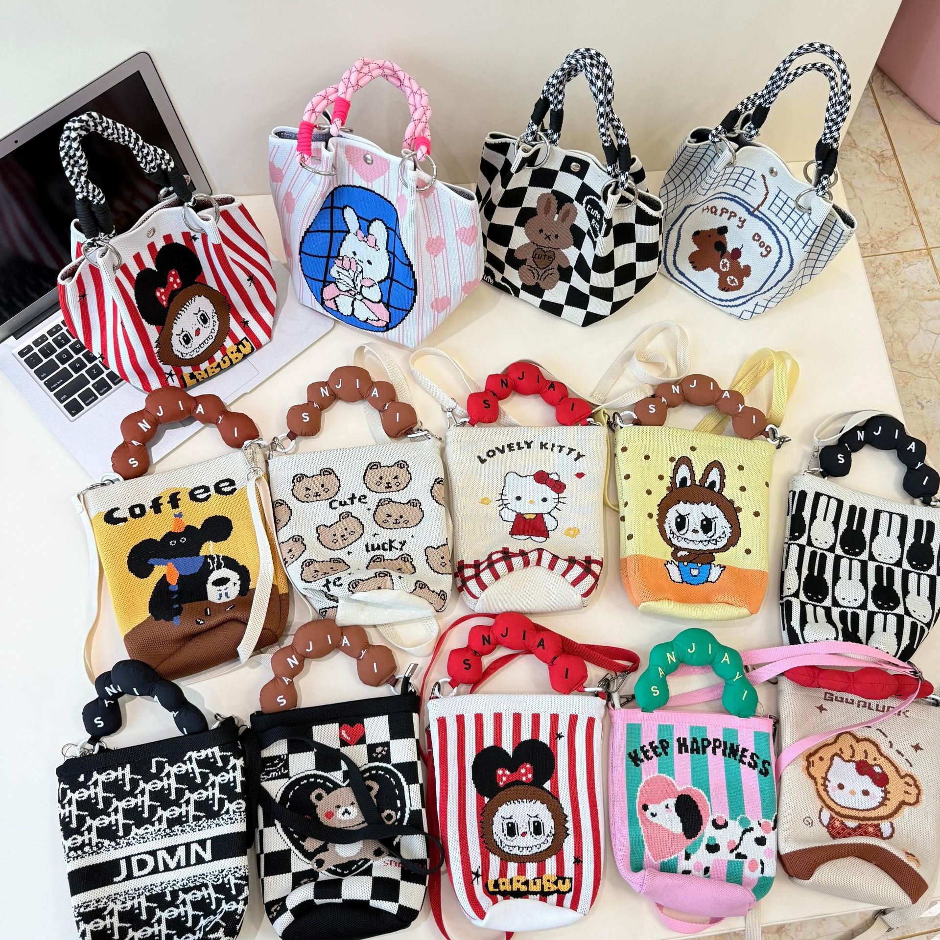 2025新款日韩针织拉链包便携上班外出杂物大容量手提袋通勤水桶包