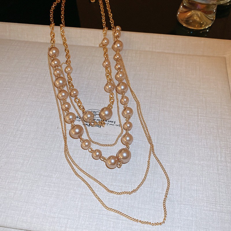 Collar con cuentas de perlas de gota de agua con diamantes transfronterizos otoño e invierno cadena de suéter de lujo ligero francés moda todo fósforo joyería de alta gama