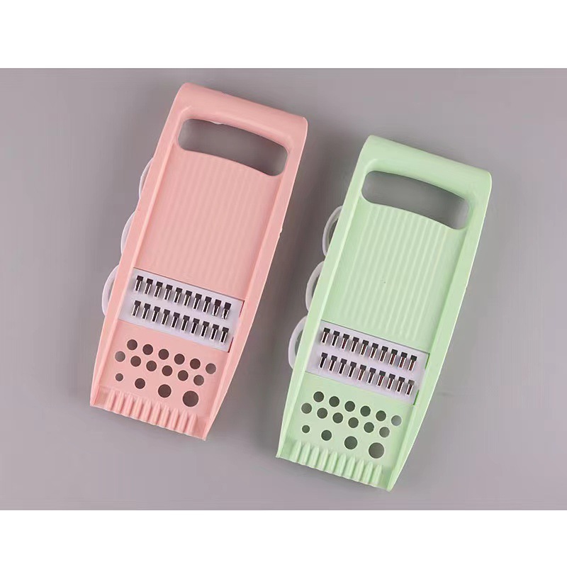 Venta al por mayor cortador de verduras 4-en-1 slicer hogar cocina rallador manual corte Rallador 2-10 yuanes tienda departamental