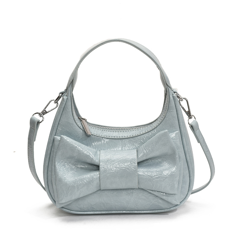 Bolso de moda coreano 2025 verano nuevo bolso femenino de alta calidad textura bolso de hombro lindo lazo bolso de mensajero