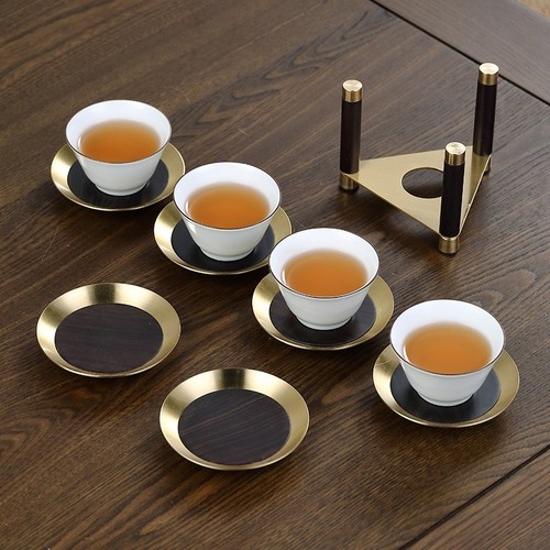 High-end copper, wood, ebony, and rosewood solid wood tea coaster—elegant, minimalist, and newly designed in the Chinese style, featuring heat-resistant functionality.