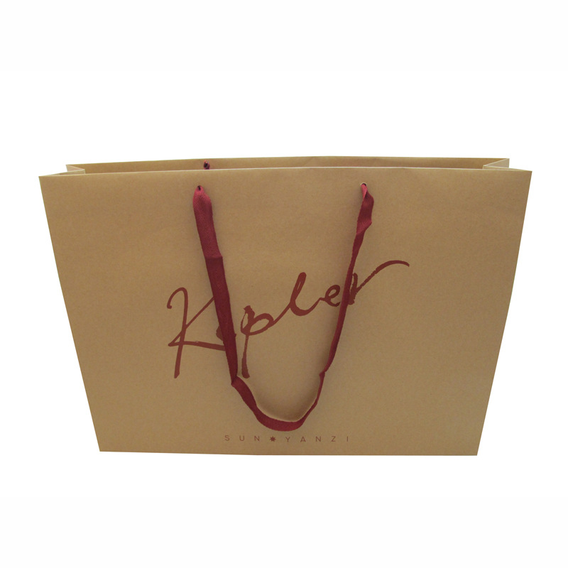 印刷牛皮手提纸袋 手挽袋 黄牛皮纸袋  服装手提纸袋