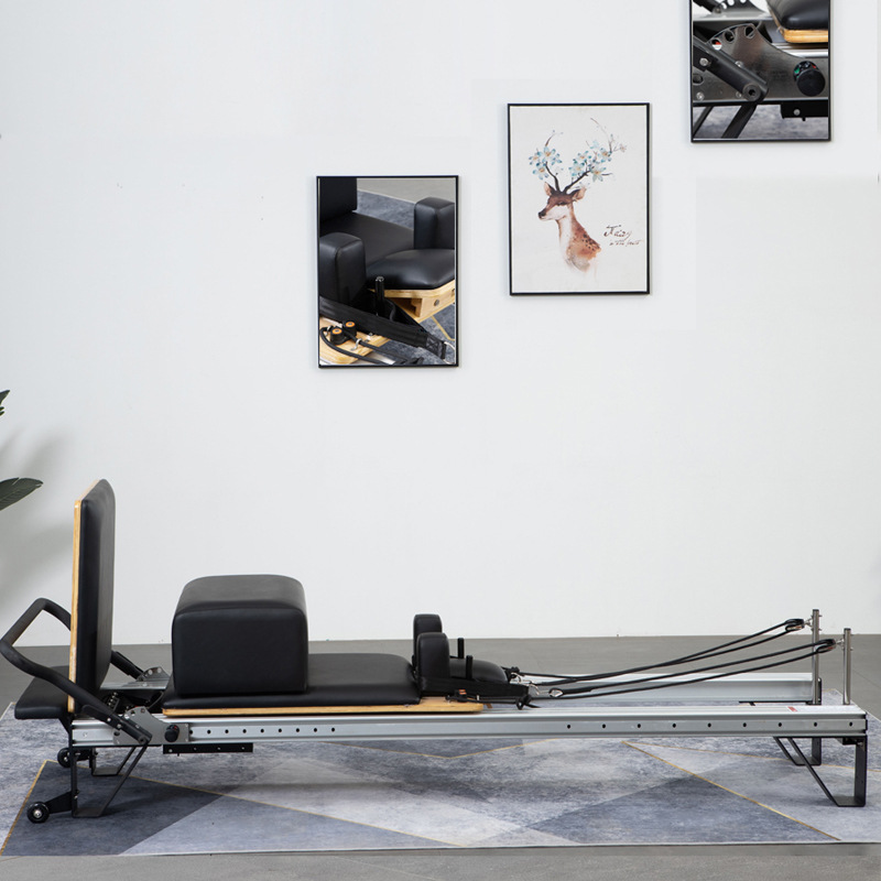 Pilates de aleación de aluminio de órbita completa cama central pequeña cama blanca y negra sala de yoga comercial reformador de pilates
