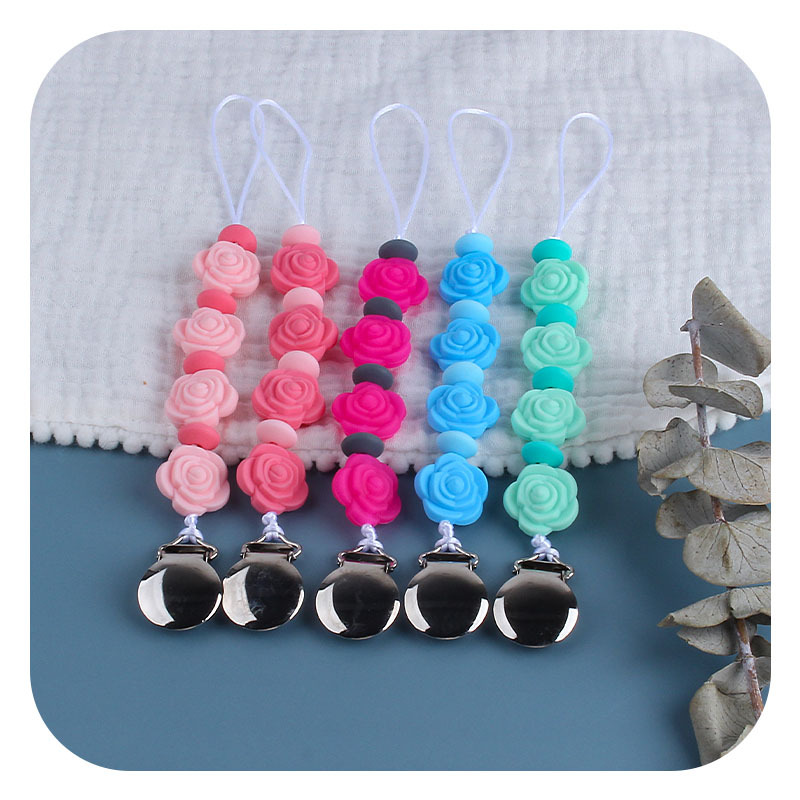 Suministros para bebés nuevo clip de chupete de hierro redondo mordedor para bebé Cadena de chupete de silicona Rosa cadena anti-caída