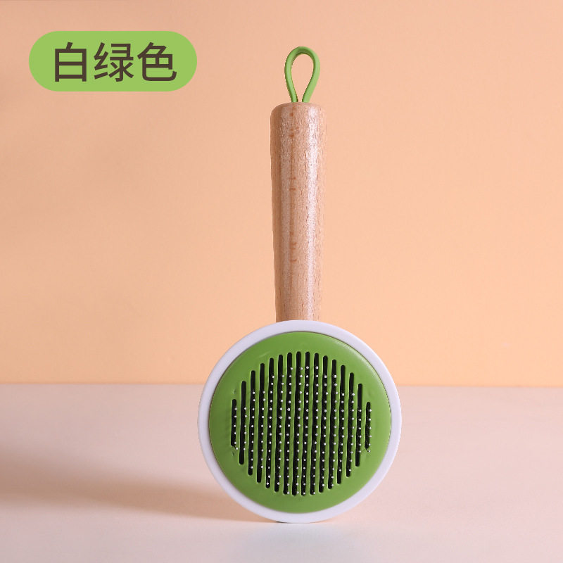 Оригинал - геометрическая расческа с деревянной ручкой зеленого и белого цвета.