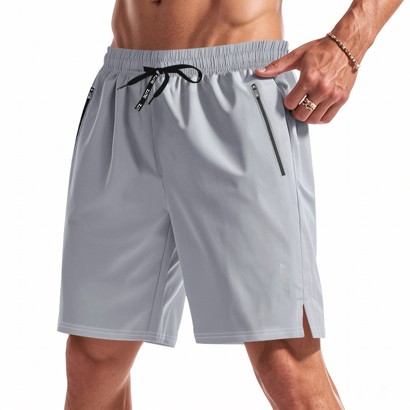 American cross-border hombre elástico relajado corredor nocturno luzoso funcional de arena de secado rápido deportivo de playa grande pantalones cortos casuales para hombre