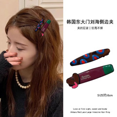 韓国の衝突色のアヒルの口はかわいい前髪を挟んで女性の2025新型のハイエンドのネットの赤い側のクリップの頭飾りのアクセサリを挟みます。