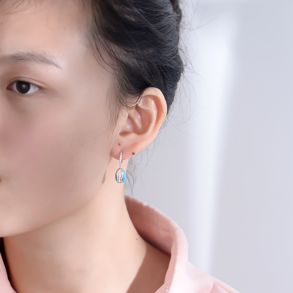 S925 plata epoxi hueco oval Concha en forma de diamantes incrustados pendientes de alto grado europeo y americano ins personalizado joyería del oído