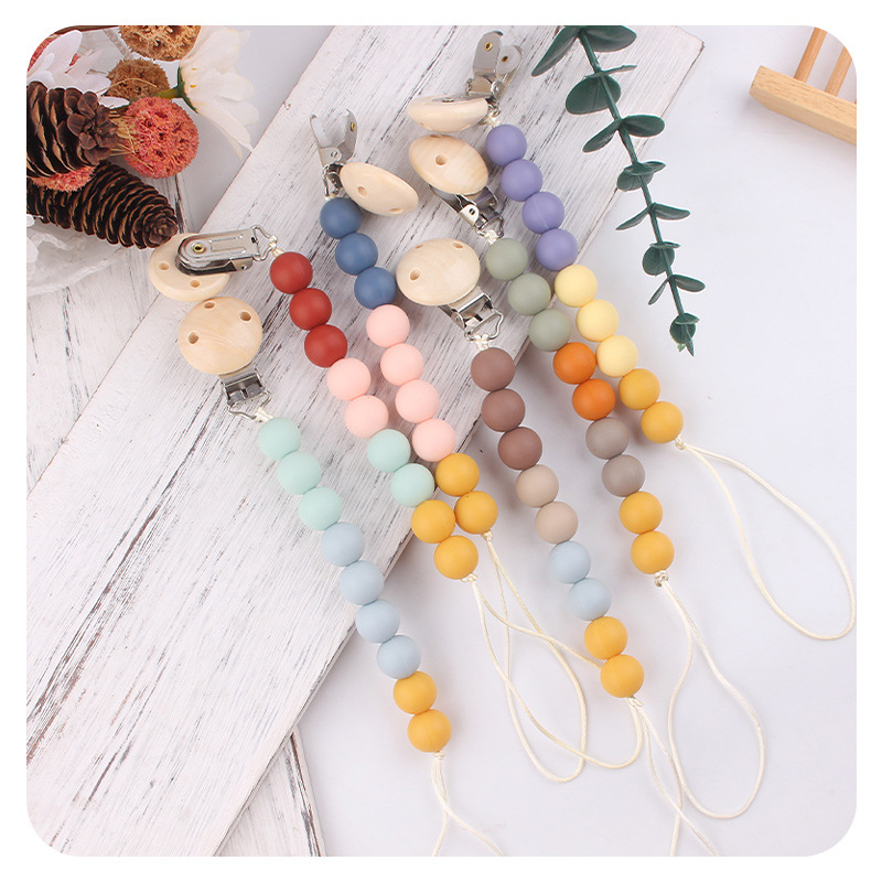 Productos para bebés y niños pequeños grano chupeta clips para calmar bebés mordiendo silicona mordiendo pegamento molar chupeta cadena anti-caída cadena nueva